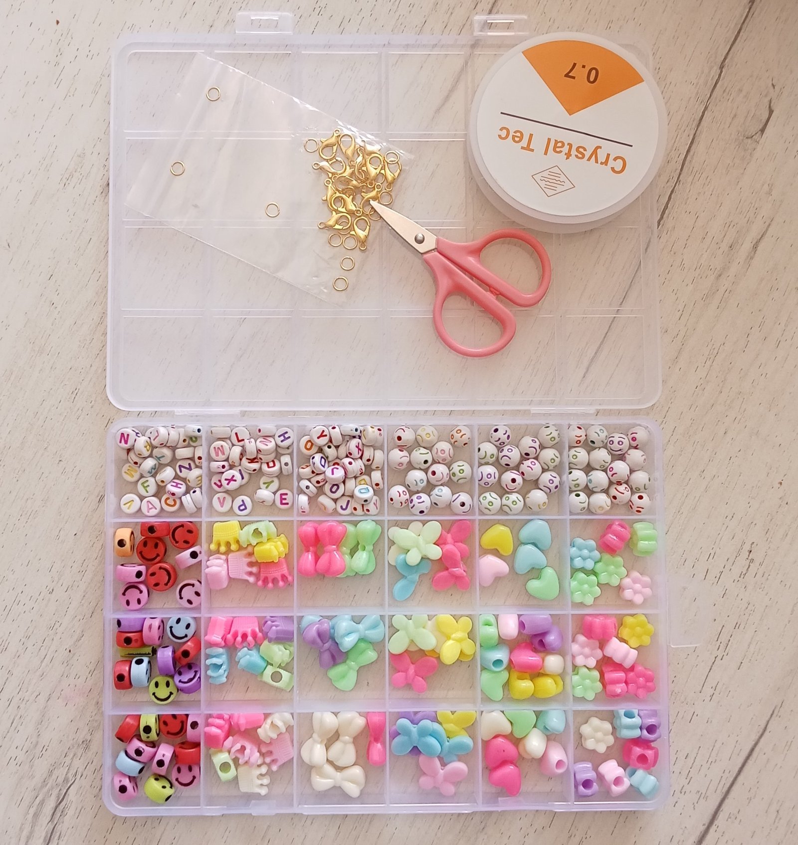 IMG20240603090342-1.jpg مجموعة بذور الزجاج و حبات الأحرف مع أدوات لصنع المجوهرات للأطفال 24 فتحة : Ensemble de pendentifs et de lettres pour la fabrication de bijoux enfant 24 grilles 889-51A - Image 1