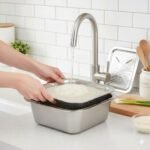 ⁦Râpe multifonctionnelle Delaval en acier inoxydable avec panier d’égouttage 3EN1 – مفرمة وقطاعة خضر متعددة الإستعمالات⁩ - الصورة ⁦2⁩