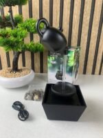 ⁦Fontaine théière flottante décoration de table avec lumières LED et pierres – نافورة مياه على شكل إبريق شاي عائم⁩ - الصورة ⁦8⁩