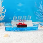 Décoration en forme de bateau de croisière insubmersible - زينة على شكل سفينة سياحية لا تغرق